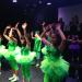 James Busby High School students dancing in lime green costumes